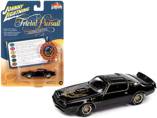 BANDIT 1977 Pontiac Trans Am Black with Gold Eagle Graphic with Poker Chip Collector's Token and Game Card "Trivial Pursuit" "Pop Culture" 2022 Release 4 1/64 Diecast Model Car by Johnny Lightning