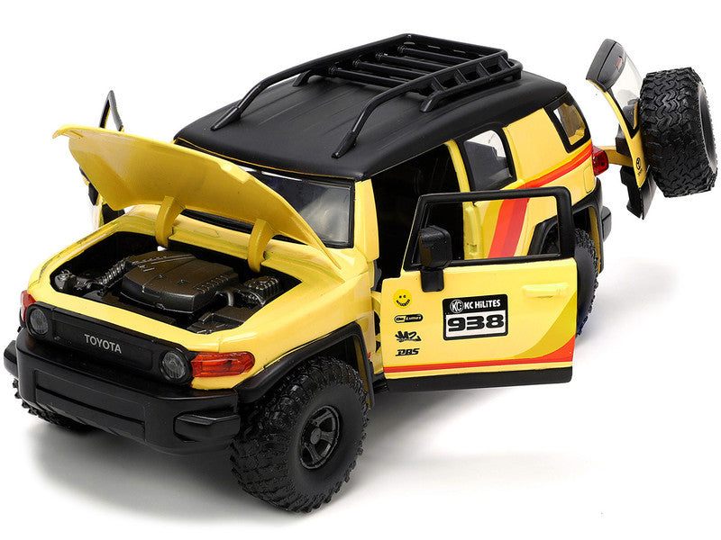 Toyota FJ Cruiser #938 Cream with Matt Black Top with Roof Rack and Stripes "KC Hilites" with Extra Wheels "Just Trucks" Series 1/24 Diecast Model Car by Jada