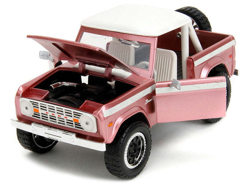 1973 Ford Bronco Pink Metallic with White Top and Graphics "Pink Slips" Series 1/24 Diecast Model Car by Jada