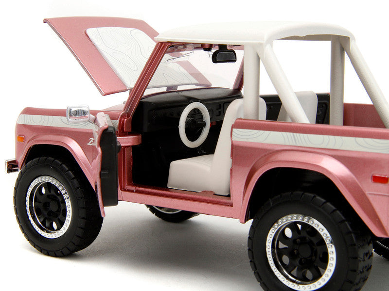 1973 Ford Bronco Pink Metallic with White Top and Graphics "Pink Slips" Series 1/24 Diecast Model Car by Jada