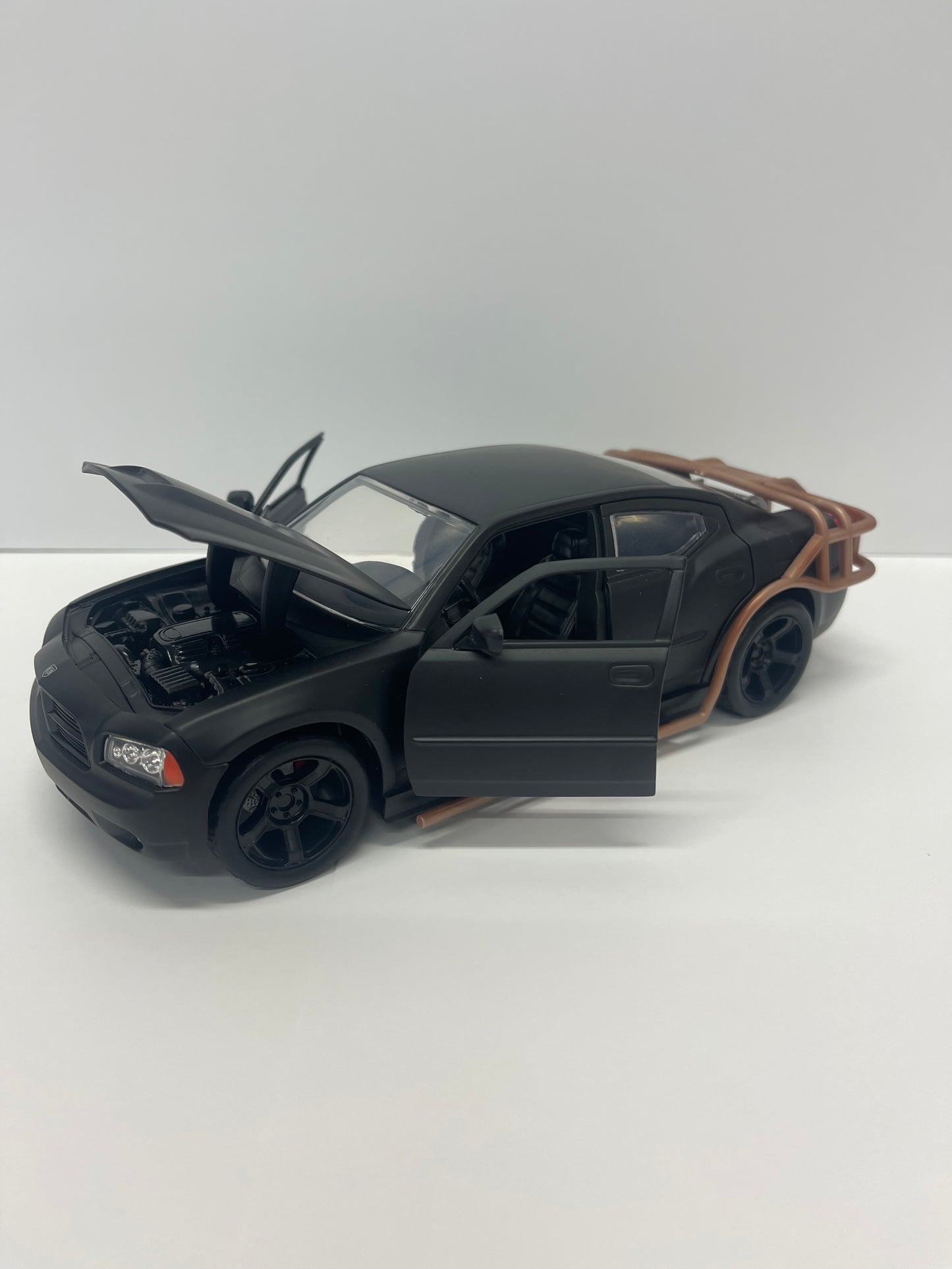 2006 Dodge Charger Matt Black with Outer Cage "Fast & Furious" Movie 1/24 Diecast Model Car by Jada