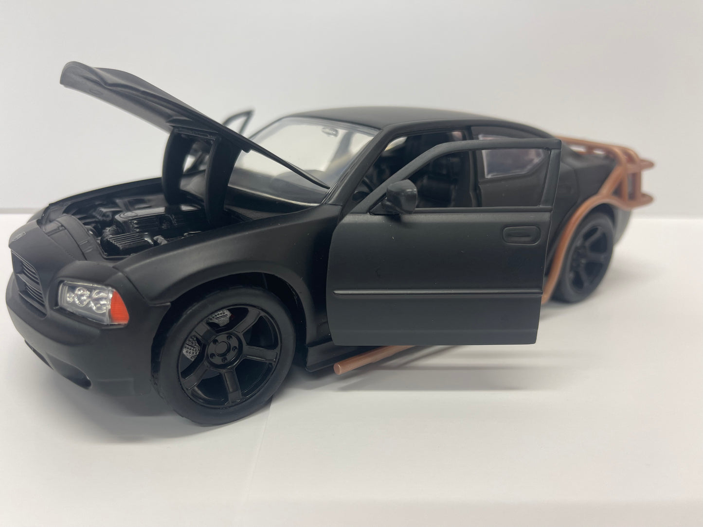 2006 Dodge Charger Matt Black with Outer Cage "Fast & Furious" Movie 1/24 Diecast Model Car by Jada