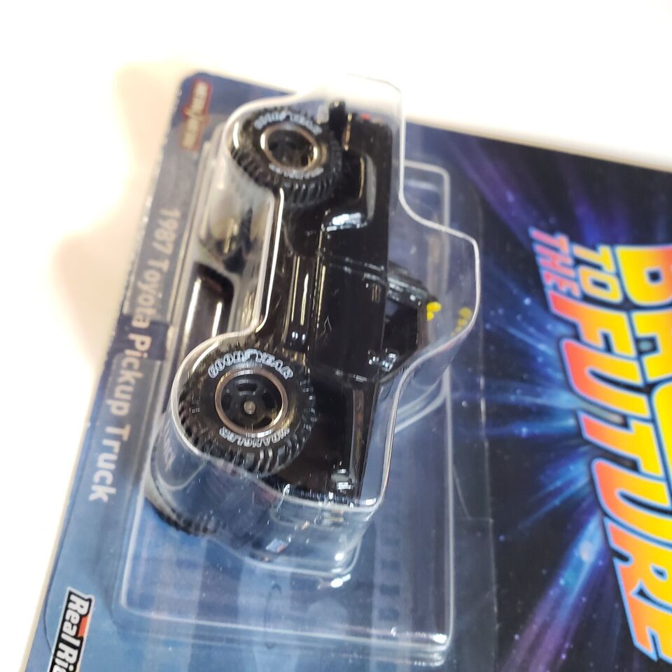 Hot Wheels Back to the Future 1987 Toyota Pickup Truck Toy - Black (HKC20)