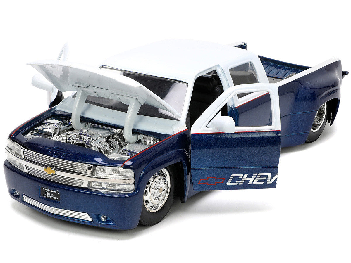 1999 Chevrolet Silverado Dually Pickup Truck Blue Metallic and White with Red Stripes with Extra Wheels "Just Trucks" Series 1/24 Diecast Model Car by Jada