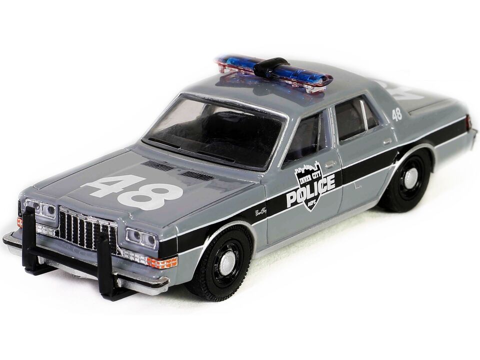 1984 PLYMOUTH GRAN FURY POLICE "THE CROW" (1994) 1/64 CAR BY GREENLIGHT 62020 E