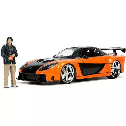 1995 Mazda RX-7 Widebody RHD (Right Hand Drive) Orange Metallic and Black with Han Diecast Figurine "The Fast and the Furious: Tokyo Drift" (2006) Movie 1/24 Diecast Model Car by Jada